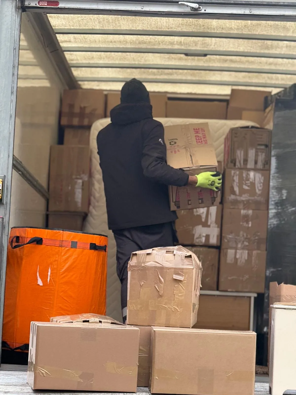 Boxes stacked in a newly finished home