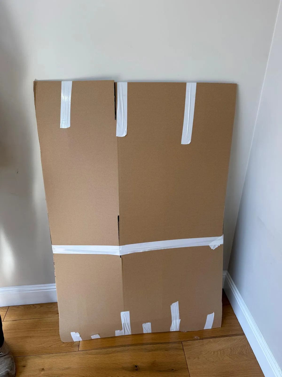Packed boxes labelled by room